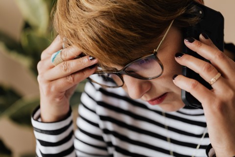 Woman having difficulty on the phone